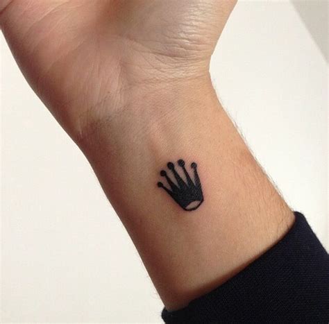 rolex krone tattoo finger